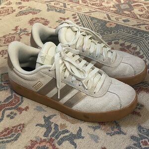 Adidas Women’s white and gold Sneakers